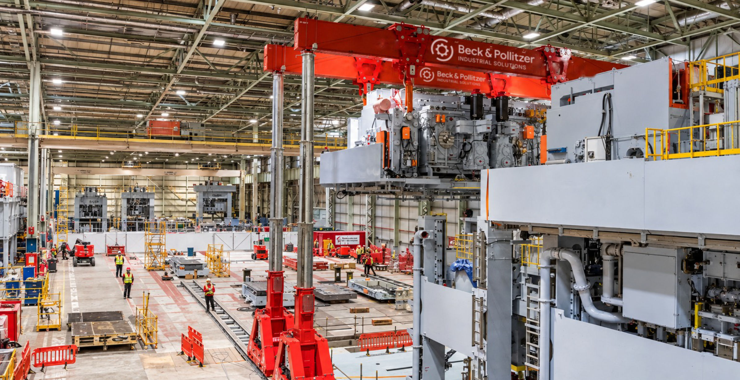 Engineers delivering an industrial installation project on a factory floor